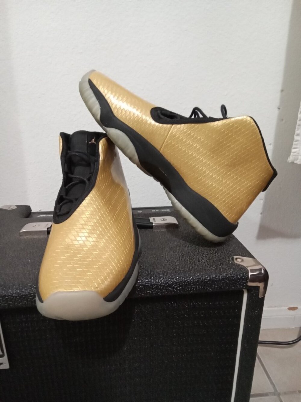 Air Jordan Future sneakers in Metallic Gold and Black, men’s size 7.